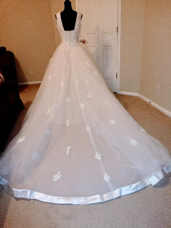 Mori Lee Princess ball gown with beautiful lace beading. White Lace Dress